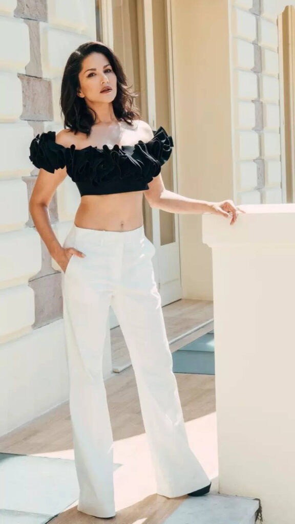 Sunny Leone Stuns at Cannes Film Festival in Black Top and White Pants